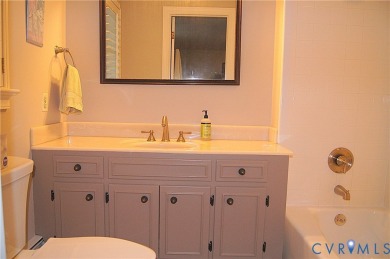 Tucked in a friendly, private neighborhood, this beautifully on Hanover Country Club in Virginia - for sale on GolfHomes.com, golf home, golf lot