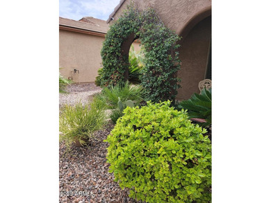 WELCOME HOME! This STUNNING, bright and open concept floor plan on Poston Butte Golf Club in Arizona - for sale on GolfHomes.com, golf home, golf lot
