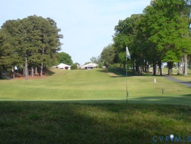 Tucked in a friendly, private neighborhood, this beautifully on Hanover Country Club in Virginia - for sale on GolfHomes.com, golf home, golf lot