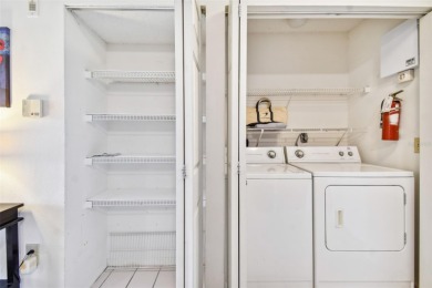 Just Listed!  **This is a second floor elevator accessible on Feather Sound Country Club in Florida - for sale on GolfHomes.com, golf home, golf lot