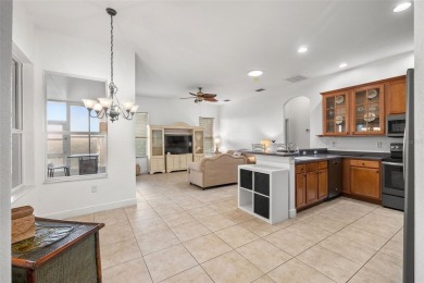 AN ELEGANT GRAND CYPRESS FLOOR PLAN ON THE 14TH GREEN OF THE on Tampa Bay Golf and Country Club in Florida - for sale on GolfHomes.com, golf home, golf lot