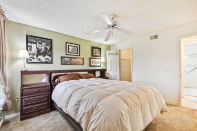 Just Listed!  **This is a second floor elevator accessible on Feather Sound Country Club in Florida - for sale on GolfHomes.com, golf home, golf lot