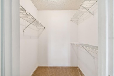 Just Listed!  **This is a second floor elevator accessible on Feather Sound Country Club in Florida - for sale on GolfHomes.com, golf home, golf lot