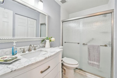 Just Listed!  **This is a second floor elevator accessible on Feather Sound Country Club in Florida - for sale on GolfHomes.com, golf home, golf lot