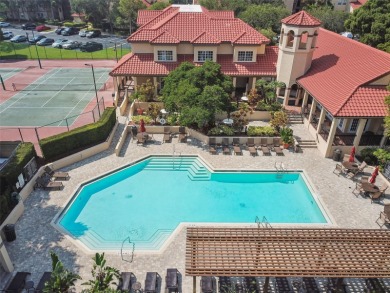 Just Listed!  **This is a second floor elevator accessible on Feather Sound Country Club in Florida - for sale on GolfHomes.com, golf home, golf lot