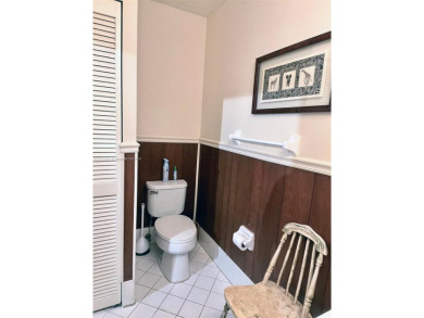 Discover this rare 3-bed, 2.5-bath townhome in a fenced, 52-home on Jim McLean Signature Course in Florida - for sale on GolfHomes.com, golf home, golf lot