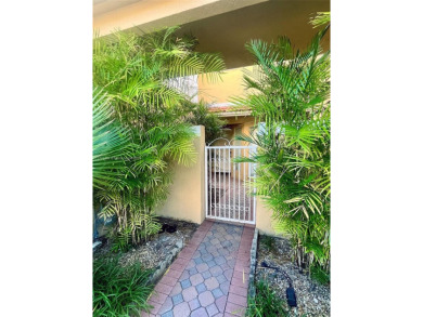 Discover this rare 3-bed, 2.5-bath townhome in a fenced, 52-home on Jim McLean Signature Course in Florida - for sale on GolfHomes.com, golf home, golf lot