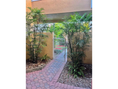 Discover this rare 3-bed, 2.5-bath townhome in a fenced, 52-home on Jim McLean Signature Course in Florida - for sale on GolfHomes.com, golf home, golf lot