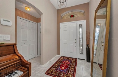 SENSATIONAL Sheffield model with EXTENDED LANAI that is enclosed on Kings Gate Golf Club in Florida - for sale on GolfHomes.com, golf home, golf lot