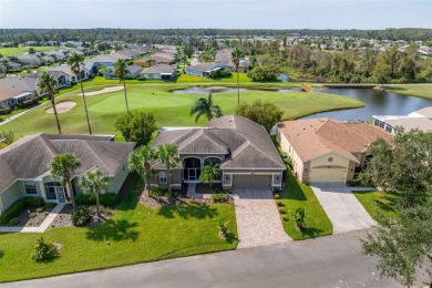 AN ELEGANT GRAND CYPRESS FLOOR PLAN ON THE 14TH GREEN OF THE on Tampa Bay Golf and Country Club in Florida - for sale on GolfHomes.com, golf home, golf lot