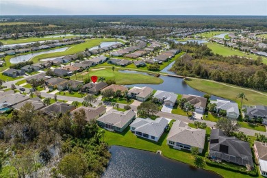 AN ELEGANT GRAND CYPRESS FLOOR PLAN ON THE 14TH GREEN OF THE on Tampa Bay Golf and Country Club in Florida - for sale on GolfHomes.com, golf home, golf lot