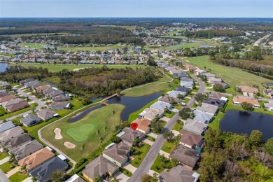 AN ELEGANT GRAND CYPRESS FLOOR PLAN ON THE 14TH GREEN OF THE on Tampa Bay Golf and Country Club in Florida - for sale on GolfHomes.com, golf home, golf lot