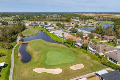 AN ELEGANT GRAND CYPRESS FLOOR PLAN ON THE 14TH GREEN OF THE on Tampa Bay Golf and Country Club in Florida - for sale on GolfHomes.com, golf home, golf lot