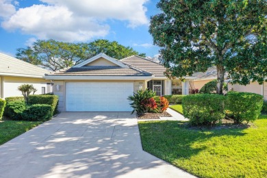 Relax looking out of this wide lake view in this freshly painted on St. Lucie Trail Golf Club in Florida - for sale on GolfHomes.com, golf home, golf lot