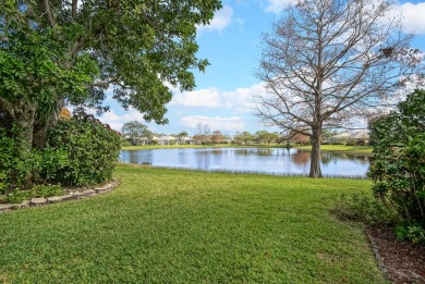 Relax looking out of this wide lake view in this freshly painted on St. Lucie Trail Golf Club in Florida - for sale on GolfHomes.com, golf home, golf lot