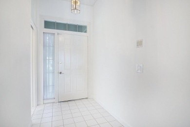 Relax looking out of this wide lake view in this freshly painted on St. Lucie Trail Golf Club in Florida - for sale on GolfHomes.com, golf home, golf lot
