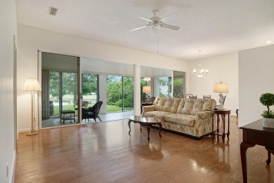 Relax looking out of this wide lake view in this freshly painted on St. Lucie Trail Golf Club in Florida - for sale on GolfHomes.com, golf home, golf lot
