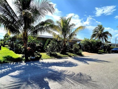 THIS HOME IS THE LARGEST MODEL BUILT IN THE COMMUNITY. IT CAN BE on Oriole Golf and Tennis Club in Florida - for sale on GolfHomes.com, golf home, golf lot