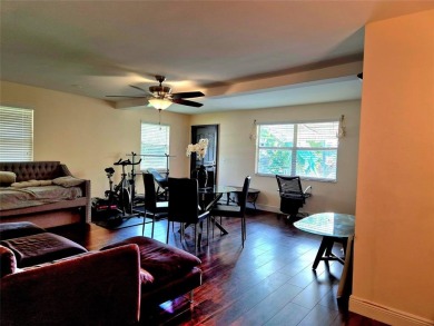 THIS HOME IS THE LARGEST MODEL BUILT IN THE COMMUNITY. IT CAN BE on Oriole Golf and Tennis Club in Florida - for sale on GolfHomes.com, golf home, golf lot