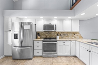 Welcome home to 40 Shamrock Way in sunny Oldsmar FL. This on East Lake Woodlands Country Club in Florida - for sale on GolfHomes.com, golf home, golf lot