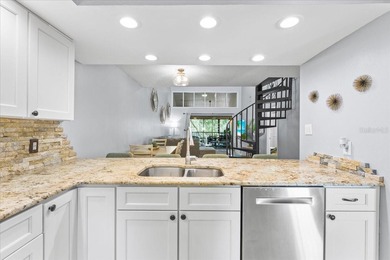 Welcome home to 40 Shamrock Way in sunny Oldsmar FL. This on East Lake Woodlands Country Club in Florida - for sale on GolfHomes.com, golf home, golf lot