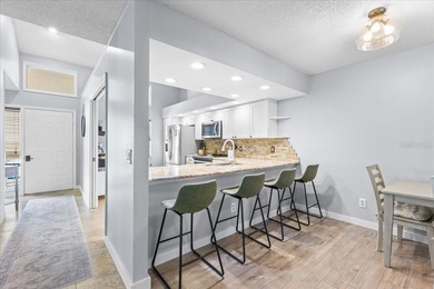 Welcome home to 40 Shamrock Way in sunny Oldsmar FL. This on East Lake Woodlands Country Club in Florida - for sale on GolfHomes.com, golf home, golf lot