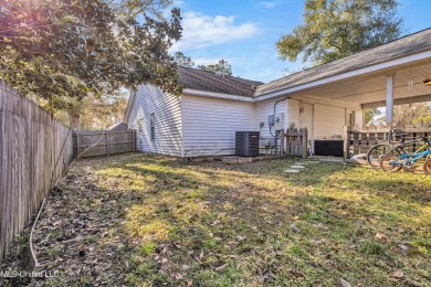 Welcome to this charming 3-bedroom, 2-bathroom home, offering a on Diamondhead Country Club in Mississippi - for sale on GolfHomes.com, golf home, golf lot