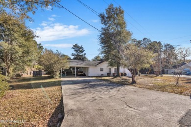 Welcome to this charming 3-bedroom, 2-bathroom home, offering a on Diamondhead Country Club in Mississippi - for sale on GolfHomes.com, golf home, golf lot