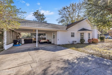 Welcome to this charming 3-bedroom, 2-bathroom home, offering a on Diamondhead Country Club in Mississippi - for sale on GolfHomes.com, golf home, golf lot