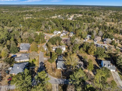 Welcome to this charming 3-bedroom, 2-bathroom home, offering a on Diamondhead Country Club in Mississippi - for sale on GolfHomes.com, golf home, golf lot