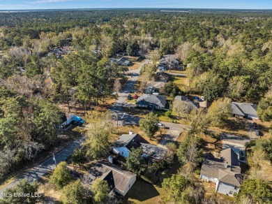 Welcome to this charming 3-bedroom, 2-bathroom home, offering a on Diamondhead Country Club in Mississippi - for sale on GolfHomes.com, golf home, golf lot