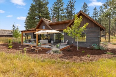 Tucked at the edge of the forest against a backdrop of manicured on Wilderness Club in Montana - for sale on GolfHomes.com, golf home, golf lot