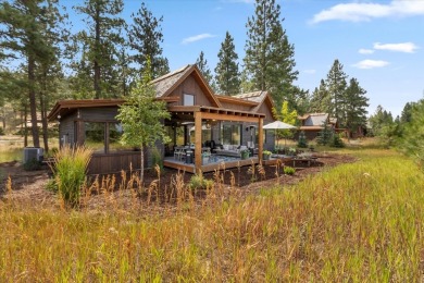 Tucked at the edge of the forest against a backdrop of manicured on Wilderness Club in Montana - for sale on GolfHomes.com, golf home, golf lot