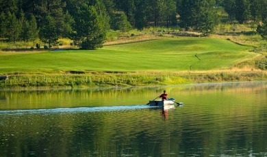 Tucked at the edge of the forest against a backdrop of manicured on Wilderness Club in Montana - for sale on GolfHomes.com, golf home, golf lot