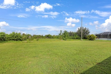 Welcome to this inviting 1963 two-bedroom, two-bathroom home on Port Charlotte Golf Club in Florida - for sale on GolfHomes.com, golf home, golf lot