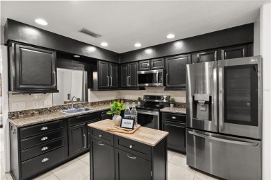 Step into a slice of paradise at 126 Duncan Trail, perfectly on Sweetwater Country Club in Florida - for sale on GolfHomes.com, golf home, golf lot