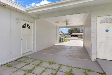 Welcome to this inviting 1963 two-bedroom, two-bathroom home on Port Charlotte Golf Club in Florida - for sale on GolfHomes.com, golf home, golf lot