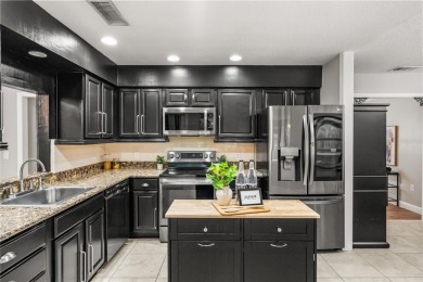 Step into a slice of paradise at 126 Duncan Trail, perfectly on Sweetwater Country Club in Florida - for sale on GolfHomes.com, golf home, golf lot