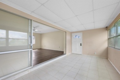 Welcome to this inviting 1963 two-bedroom, two-bathroom home on Port Charlotte Golf Club in Florida - for sale on GolfHomes.com, golf home, golf lot