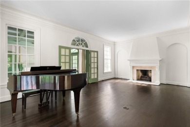 This stunning Mediterranean-style estate exudes timeless on Bobby Jones Golf Club in Georgia - for sale on GolfHomes.com, golf home, golf lot