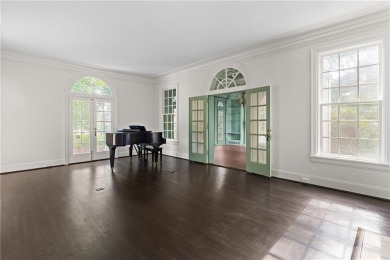 This stunning Mediterranean-style estate exudes timeless on Bobby Jones Golf Club in Georgia - for sale on GolfHomes.com, golf home, golf lot