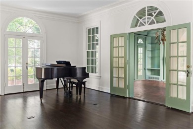 This stunning Mediterranean-style estate exudes timeless on Bobby Jones Golf Club in Georgia - for sale on GolfHomes.com, golf home, golf lot