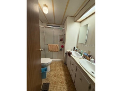 This well-maintained 1104sqft 3-bedroom 2-bath home is in on Brookridge Country Club in Florida - for sale on GolfHomes.com, golf home, golf lot