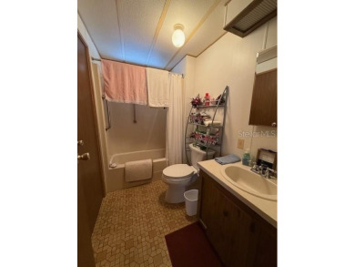 This well-maintained 1104sqft 3-bedroom 2-bath home is in on Brookridge Country Club in Florida - for sale on GolfHomes.com, golf home, golf lot