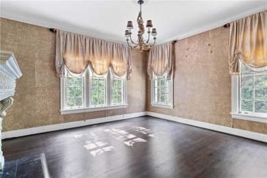 This stunning Mediterranean-style estate exudes timeless on Bobby Jones Golf Club in Georgia - for sale on GolfHomes.com, golf home, golf lot