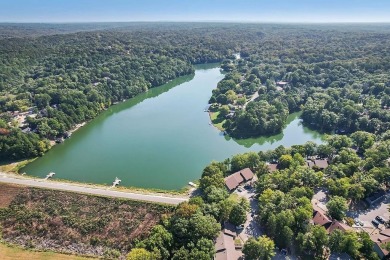 This charming and updated 2-bedroom, 2-bath townhome on Lake on Bella Vista Country Club - Berksdale in Arkansas - for sale on GolfHomes.com, golf home, golf lot