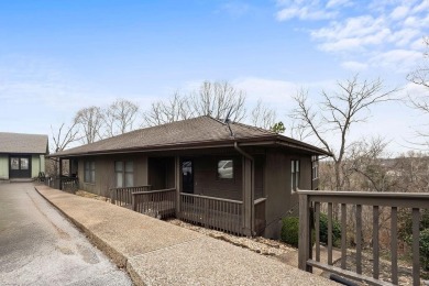 This charming and updated 2-bedroom, 2-bath townhome on Lake on Bella Vista Country Club - Berksdale in Arkansas - for sale on GolfHomes.com, golf home, golf lot