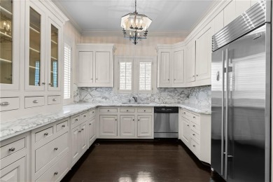 This stunning Mediterranean-style estate exudes timeless on Bobby Jones Golf Club in Georgia - for sale on GolfHomes.com, golf home, golf lot