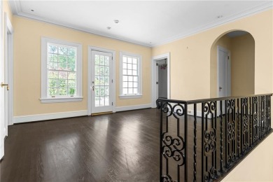 This stunning Mediterranean-style estate exudes timeless on Bobby Jones Golf Club in Georgia - for sale on GolfHomes.com, golf home, golf lot