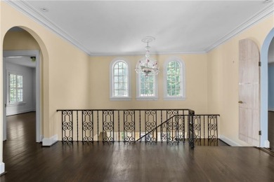 This stunning Mediterranean-style estate exudes timeless on Bobby Jones Golf Club in Georgia - for sale on GolfHomes.com, golf home, golf lot